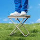 Tabouret pliant portable au design inspiré d'un sac à main